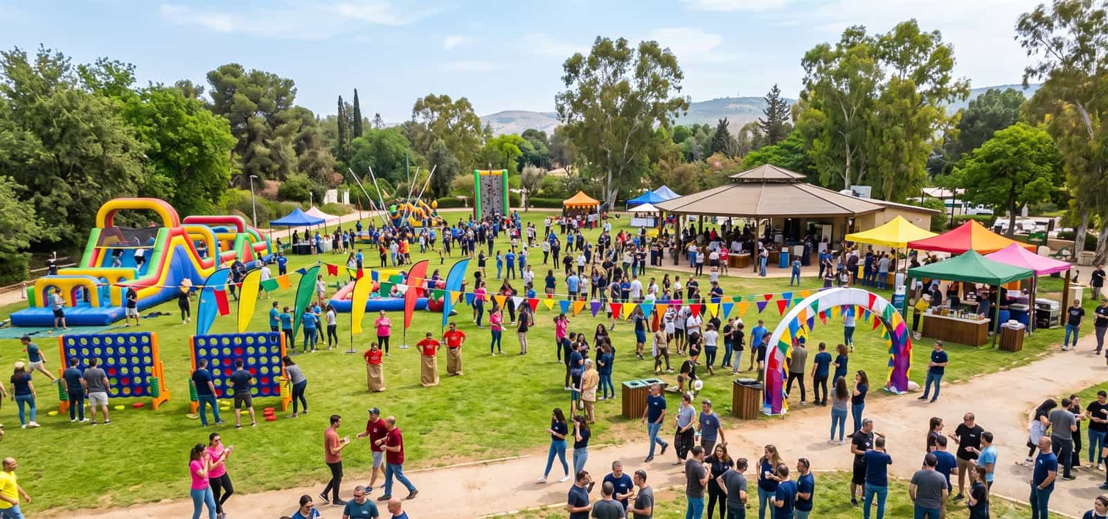 אירוע גיבוש חברה בחוץ עם עמדות אטרקציות ופעילויות